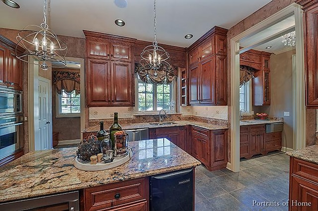 305 S Wright St, Naperville, IL 60540 - kitchen with a sink, a wealth of natural light, and a notable chandelier