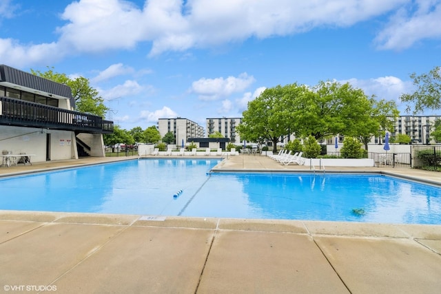 9701 N Dee Rd Unit 4C, Niles, IL 60714 - community pool featuring a patio area