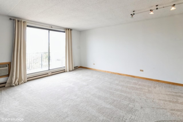 9701 N Dee Rd Unit 4C, Niles, IL 60714 - spare room with light colored carpet, baseboards, and a wall unit AC