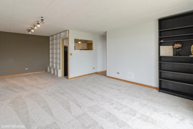 9701 N Dee Rd Unit 4C, Niles, IL 60714 - unfurnished living room with carpet and baseboards