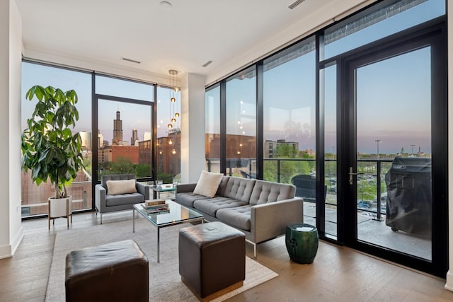 sunroom / solarium featuring a view of city