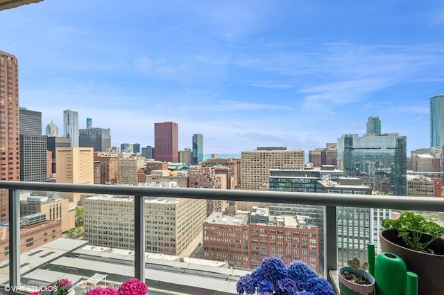 balcony featuring a skyline view