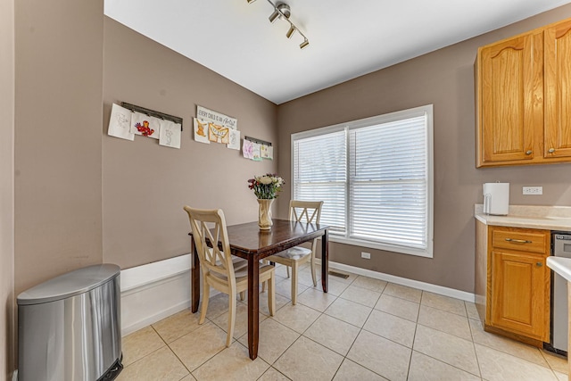 9163 Falcon Greens Dr, Lakewood, IL 60014 - dining room featuring light tile patterned flooring and baseboards