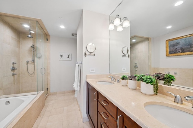 518 Winnetka Ave Unit 301, Winnetka, IL 60093 - bathroom with a stall shower, recessed lighting, visible vents, and a sink