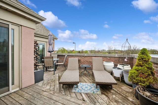 518 Winnetka Ave Unit 301, Winnetka, IL 60093 - wooden deck featuring outdoor dining area