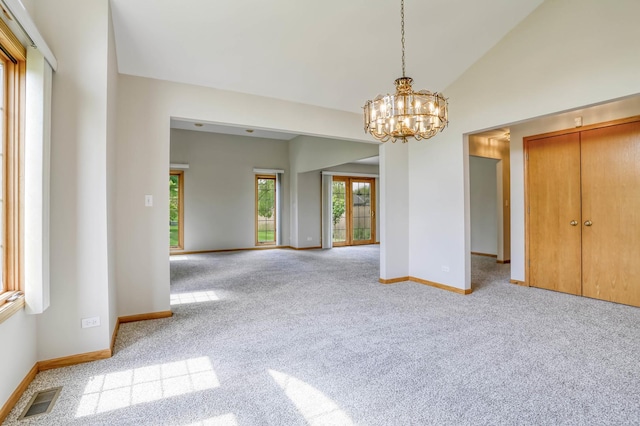 13860 Steeples Rd, Lemont, IL 60439 - unfurnished dining area featuring carpet floors, a chandelier, baseboards, and lofted ceiling