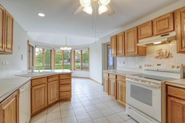 13860 Steeples Rd, Lemont, IL 60439 - kitchen with white appliances, under cabinet range hood, a sink, backsplash, and light countertops