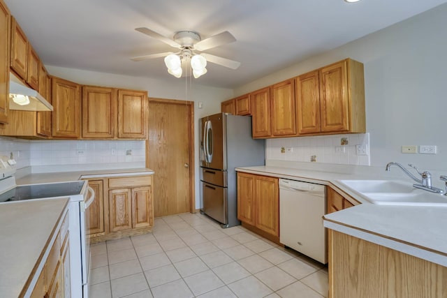 13860 Steeples Rd, Lemont, IL 60439 - kitchen featuring white appliances, a sink, under cabinet range hood, a ceiling fan, and decorative backsplash