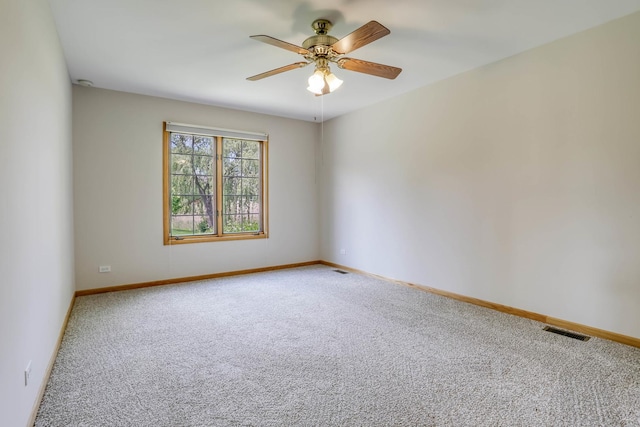 13860 Steeples Rd, Lemont, IL 60439 - spare room featuring carpet flooring, a ceiling fan, and baseboards