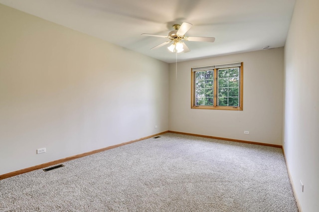 13860 Steeples Rd, Lemont, IL 60439 - empty room featuring a ceiling fan, light colored carpet, and baseboards