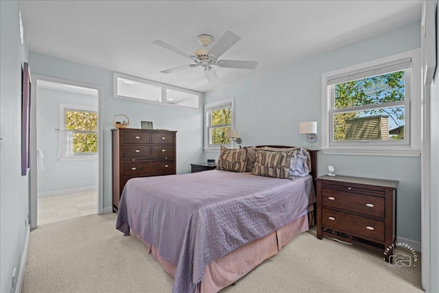 585 Apache Dr, Batavia, IL 60510 - carpeted bedroom with a ceiling fan and baseboards