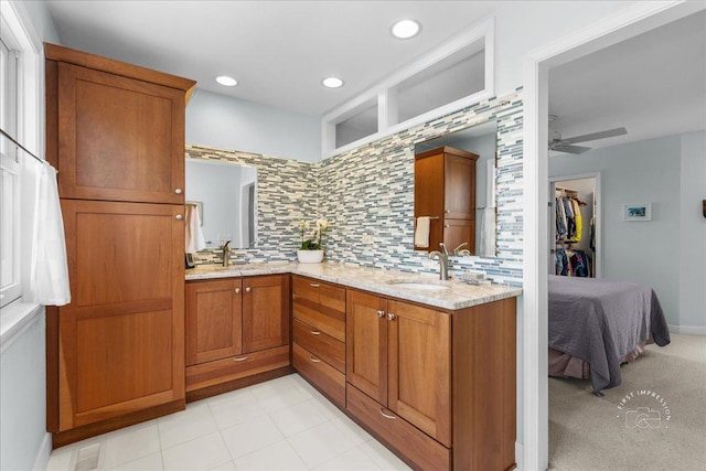585 Apache Dr, Batavia, IL 60510 - full bathroom with backsplash, ceiling fan, double vanity, and recessed lighting