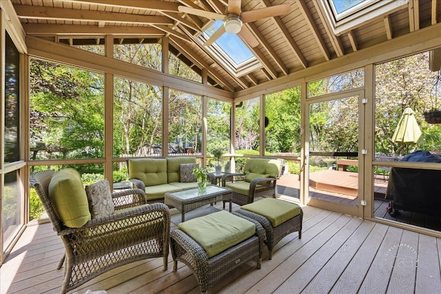 585 Apache Dr, Batavia, IL 60510 - sunroom / solarium with a skylight, an outdoor hangout area, ceiling fan, lofted ceiling, and plenty of natural light