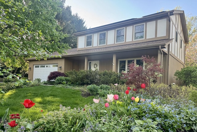 585 Apache Dr, Batavia, IL 60510 - view of front of property with a garage and a front yard