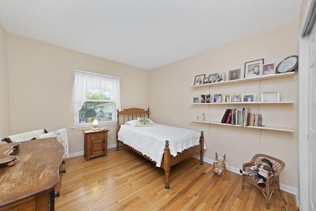 1557 Swallow St, Naperville, IL 60565 - bedroom with light wood-style floors and baseboards