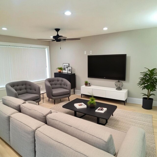 empty room with baseboards, light wood-style floors, an inviting chandelier, and recessed lighting