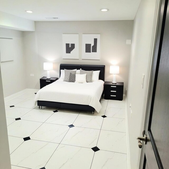 bathroom featuring toilet, marble finish floor, visible vents, vanity, and bathtub / shower combination