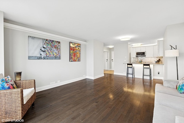 5415 N Sheridan Rd Unit 3004, Chicago, IL 60640 - living area featuring dark wood-type flooring and baseboards