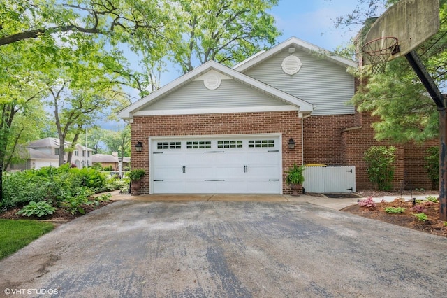 18038 Whitman Ln, Lansing, IL 60438 - view of front of house featuring brick siding, concrete driveway, and a garage