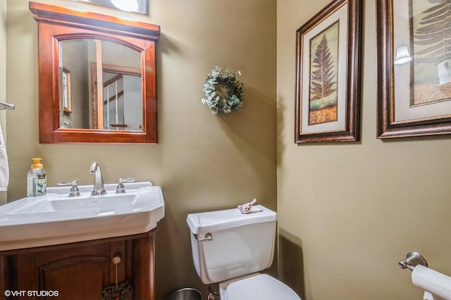 18038 Whitman Ln, Lansing, IL 60438 - half bathroom featuring toilet and vanity