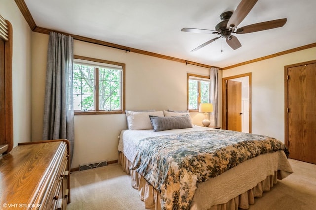 18038 Whitman Ln, Lansing, IL 60438 - bedroom with light carpet, multiple windows, crown molding, and a ceiling fan