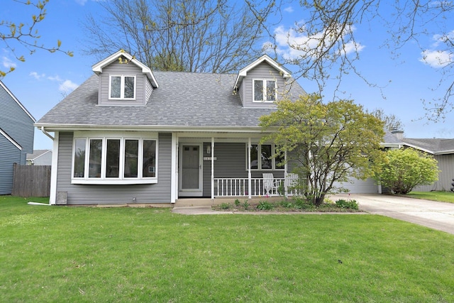 cape cod-style house with covered porch, roof with shingles, and concrete driveway