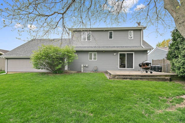 back of house featuring a chimney, cooling unit, a wooden deck, and roof with shingles