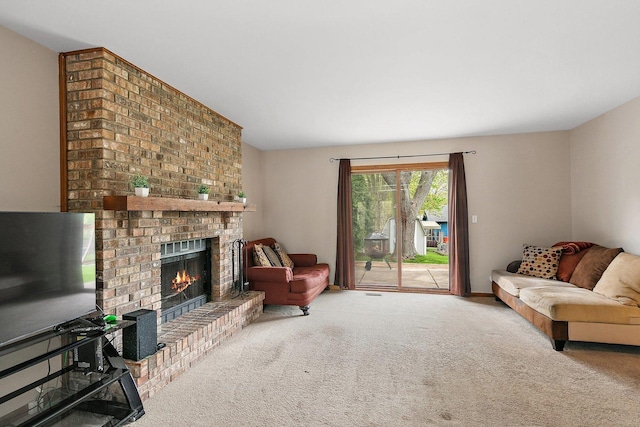 carpeted living area featuring a fireplace