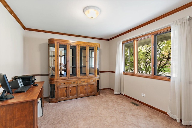 home office with light colored carpet, ornamental molding, and baseboards