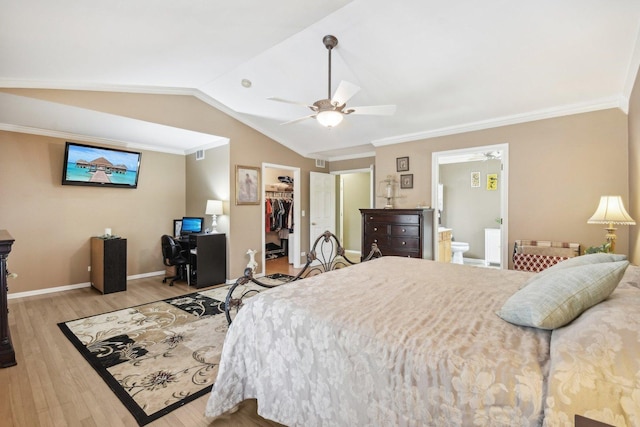 10409 Evendale Dr, Huntley, IL 60142 - bedroom with vaulted ceiling, wood finished floors, a closet, a spacious closet, and crown molding