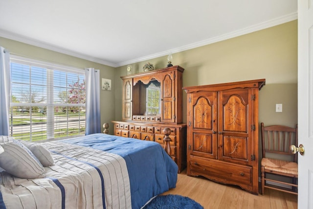 10409 Evendale Dr, Huntley, IL 60142 - bedroom featuring light wood-style flooring and ornamental molding