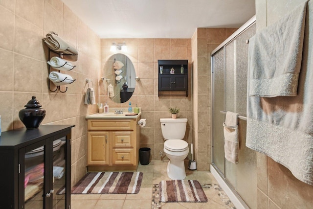 10409 Evendale Dr, Huntley, IL 60142 - full bathroom with tile walls, toilet, a stall shower, tile patterned flooring, and vanity