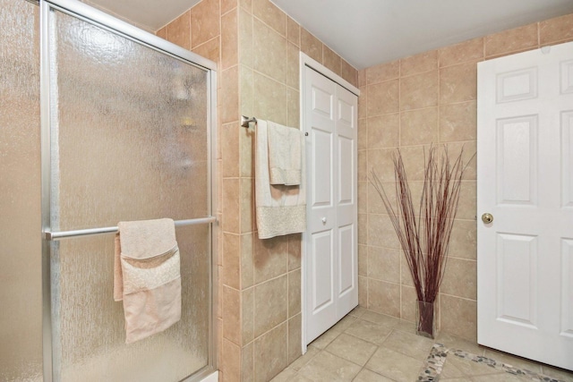10409 Evendale Dr, Huntley, IL 60142 - full bath featuring tile walls, a shower stall, and tile patterned flooring