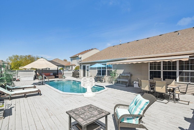 10409 Evendale Dr, Huntley, IL 60142 - view of swimming pool featuring a deck, outdoor dining space, outdoor lounge area, and fence