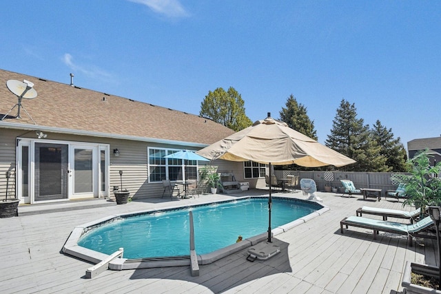 10409 Evendale Dr, Huntley, IL 60142 - view of pool featuring a wooden deck, outdoor dining space, and fence