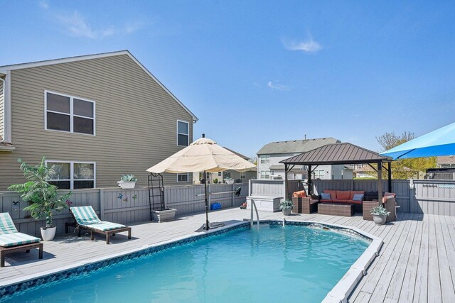 10409 Evendale Dr, Huntley, IL 60142 - view of pool featuring a gazebo, an outdoor hangout area, a deck, and fence