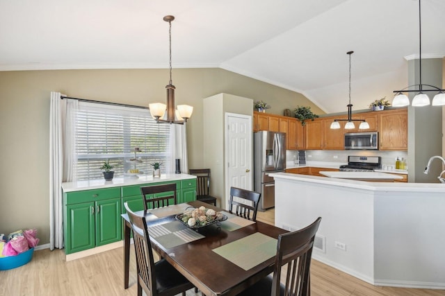 10409 Evendale Dr, Huntley, IL 60142 - dining space with lofted ceiling, a chandelier, light wood-style floors, crown molding, and baseboards