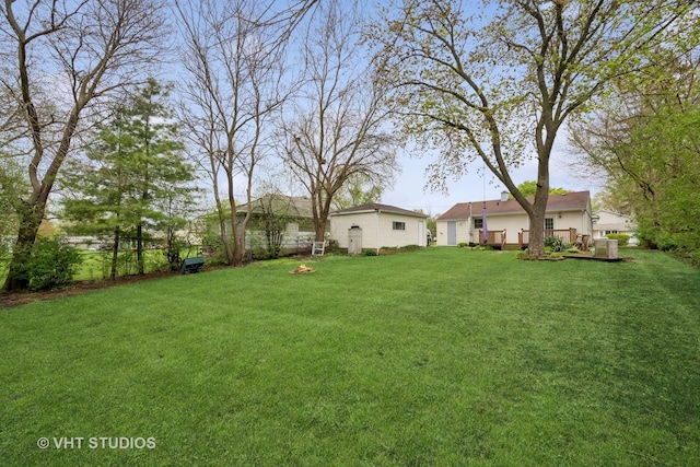 view of yard featuring a deck