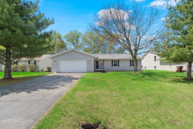 ranch-style house with a front lawn, driveway, and an attached garage