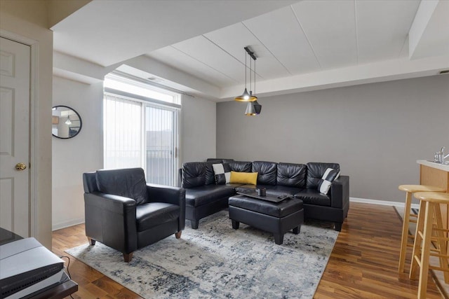 2734 S Wentworth Ave Unit 317, Chicago, IL 60616 - living room with baseboards, a tray ceiling, and wood finished floors