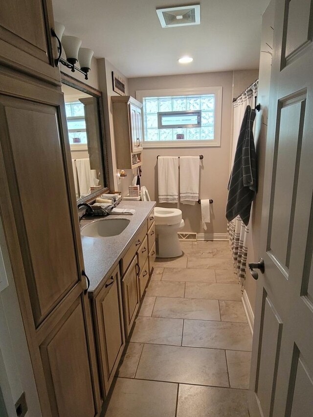 6N241 Roselle Rd, Roselle, IL 60172 - full bathroom with vanity, toilet, baseboards, curtained shower, and recessed lighting