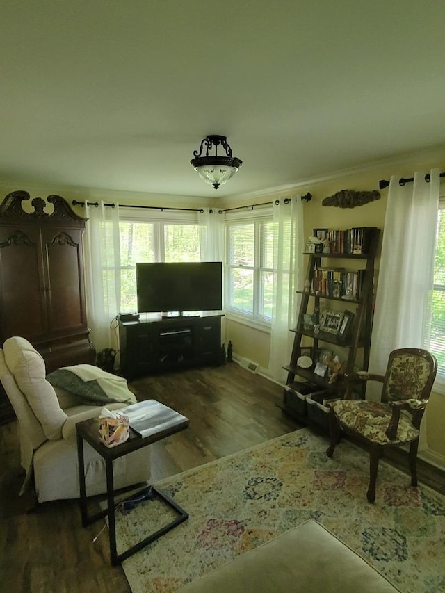 6N241 Roselle Rd, Roselle, IL 60172 - living room featuring wood finished floors, baseboards, and crown molding