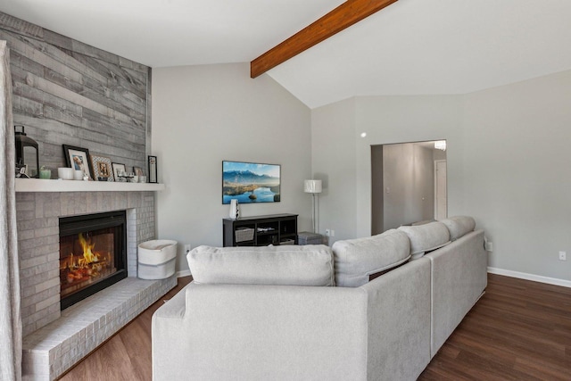 living area with wood finished floors, baseboards, and a fireplace