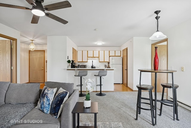 1443 Spring Brook Ct Unit 1B, Round Lake Beach, IL 60073 - living room with light colored carpet and a ceiling fan
