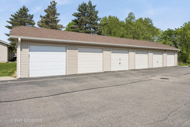 1443 Spring Brook Ct Unit 1B, Round Lake Beach, IL 60073 - view of garage