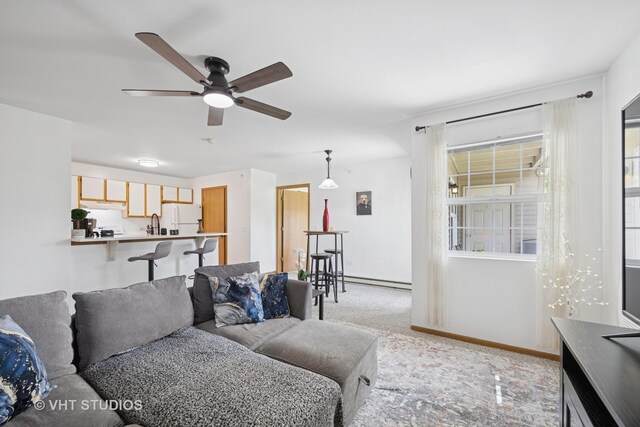 1443 Spring Brook Ct Unit 1B, Round Lake Beach, IL 60073 - living area with a ceiling fan, baseboards, and carpet floors