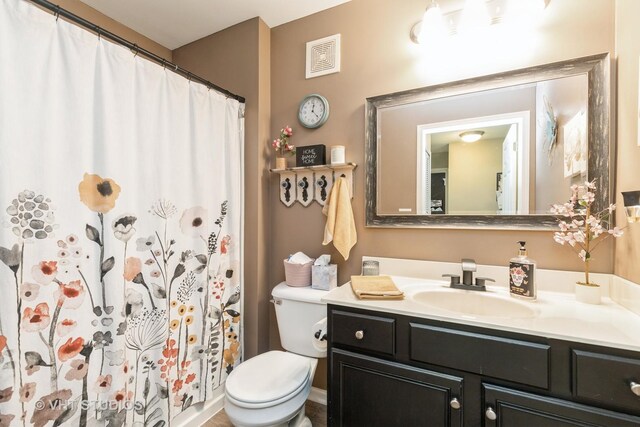 1222 Hillsborough Ct Unit 1222, Crystal Lake, IL 60014 - bathroom with toilet, vanity, and a shower with curtain