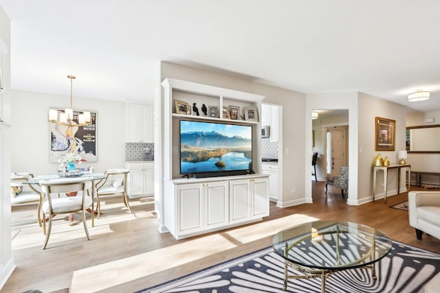 316 Spring Creek Cir, Schaumburg, IL 60173 - living room with light wood-type flooring and baseboards