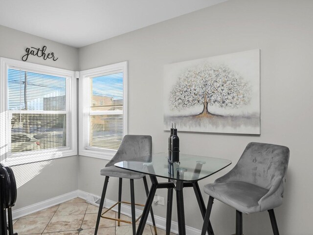 417 Oglesby Ave, Calumet City, IL 60409 - dining area featuring light tile patterned floors and baseboards