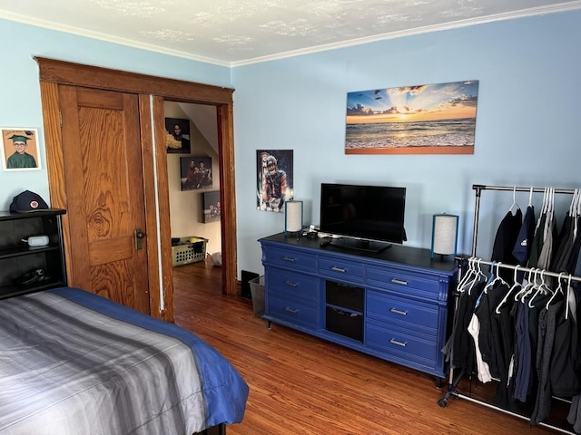 625 Oak Ave, Aurora, IL 60506 - bedroom featuring dark wood finished floors and crown molding